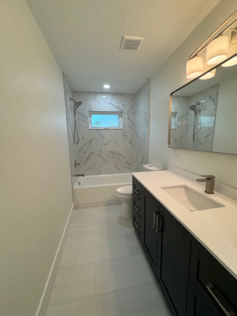 A luxurious, newly remodeled bathroom completed by BA Construction in Florida